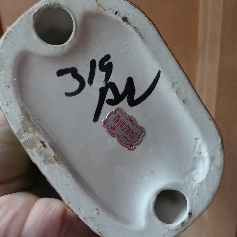 Set of ceramic chickens sticker still on it says New Orleans Japan